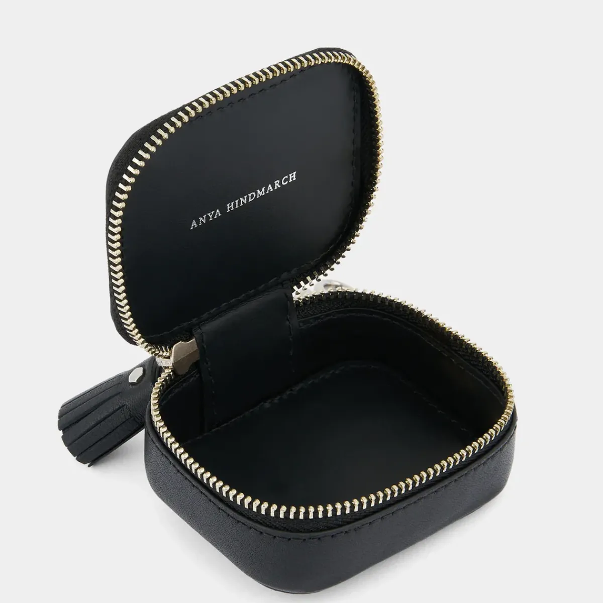 Anya Hindmarch AH Earphone Case Studded Eyes in Black